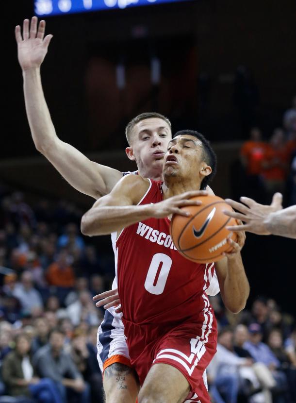 Trice and the Badgers were suffocated by Virginia's defense all night/Photo: Steve Helber/Associated Press