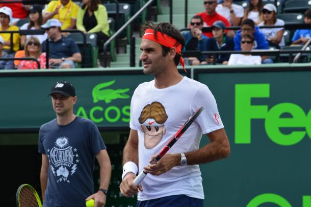 Federer, sporting his new Nike Emoji T-shirt, warms up before the tournament in front of fans. Credit: Miami Open