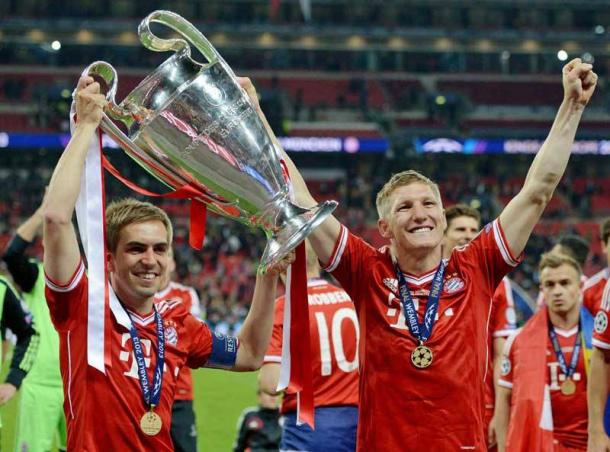 Lahm y Schweinsteiger celebran la Champions League del triplete. // (Foto de archivo)