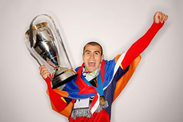 Yura Movsisyan celebrating with the MLS Cup in 2009 when they defeated the Los Angele Galaxy in the final at Qwest Field. Photo provided by Getty Images.  