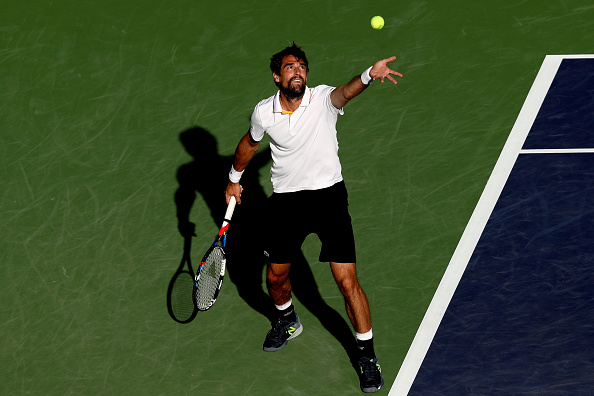 Jeremy Chardy gearing up to serve (Photo: Matthew Stockman/Getty Images)