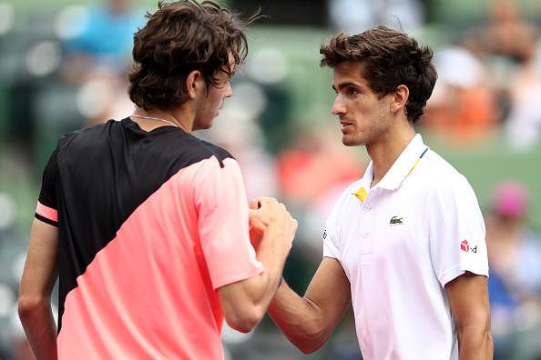 Taylor Fritz congratulates Pierre-Hugues Herbert on his win (Photo: Matthew Stockman/Getty Images)