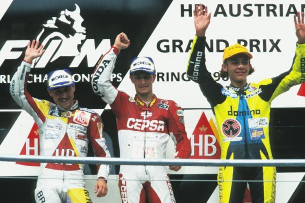 A very young Rossi claiming third on the podium after the 1996 Austrian 125cc race - www.speedweek.com