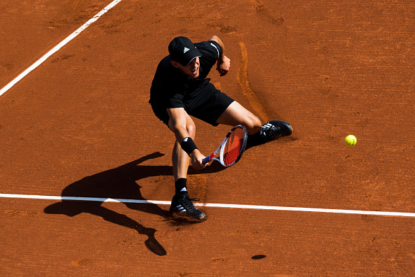 Dominic Thiem plays a forehand shot (Photo: Alex Caparros/Getty Images)