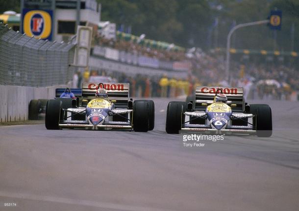 Nelson Piquet makes a move on Nigel Mansell. It wasn't be be a glorious weekend for either of them. | Photo: Getty Images/Tony Feder