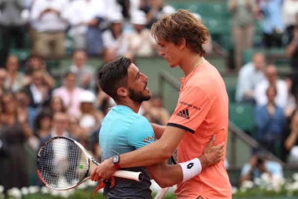 Dzumhur and Zverev embrace following the thrilling encounter (Getty/Matthew Stockman)