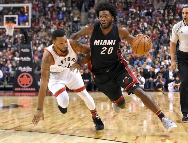 Miami Heat forward Justise Winslow (20) dribbles the ball past Toronto Raptors guard Norman Powell (24) |Dan Hamilton-USA TODAY Sports|