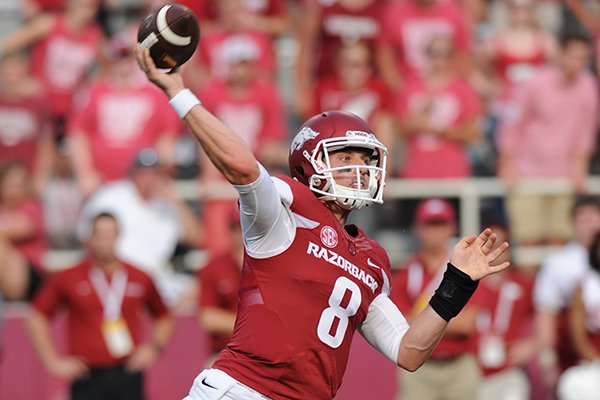 Austin Allen throws a pass against UTEP at Donald W. Reynolds Razorback Stadium in Fayetteville/Getty Images