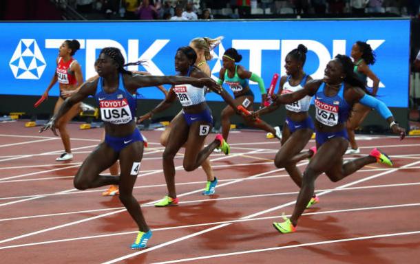 Akinosun hands over the baton to Bowie, narrowly ahead of the British team (Getty/Alexander Hassenstein)