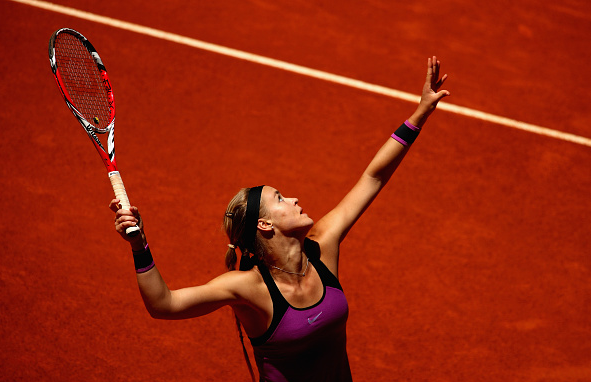 Anna Karolina Schmiedlova serves to Garbiñe Muguruza during their first round encounter at the 2016 Mutua Madrid Open. | Photo: Clive Brunskill/Getty Images Europe