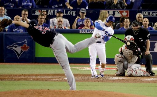 Ezequiel Carrera blasts a triple off Indians pitcher Zach McAllister (AP Photo/Charlie Riedel)