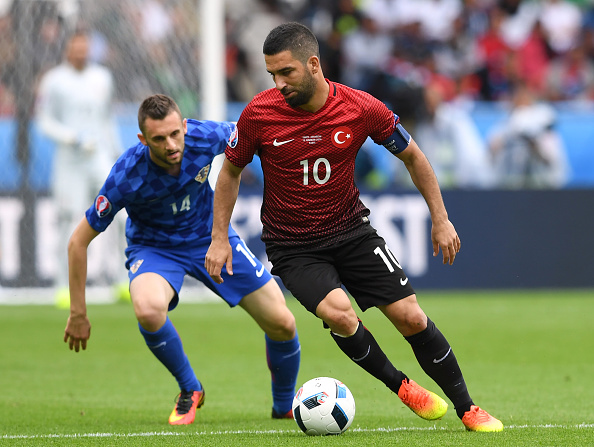 Arda Turan on the ball durng today's defeat. | Image credit: FRANCISCO LEONG/AFP/Getty Images