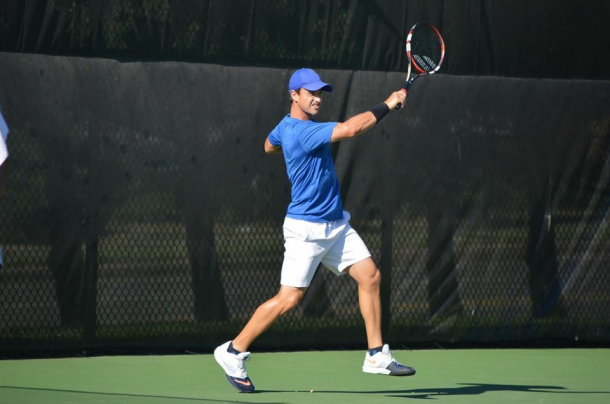 Jean-Yves Aubone follows through on a forehand. | Photo via Aubone's official website