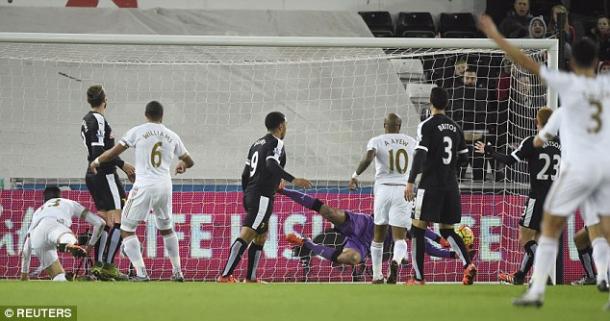 Williams scores the all-important goal. (Image credit: Reuters)