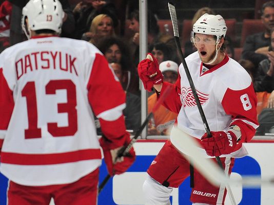 Justin Abdelkader (8) celebrate with Pavel Daysyuk (13) after scoring a goal. Photo via Gary A. Vasquez, USA TODAY Sports