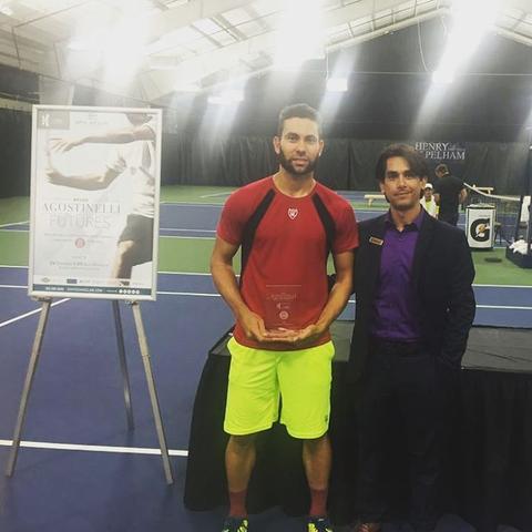 Adam El Mihdawy poses with the winner’s trophy after winning the 2016 Bruno Agostinelli Futures. | Photo via Loriet