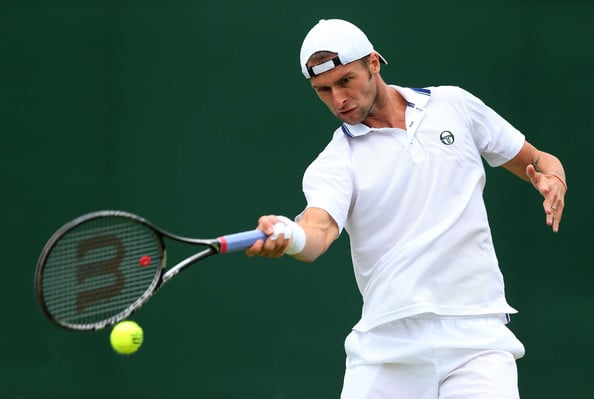 Ungur hitting a forehand at Wimbledon. | Photo: Getty Images