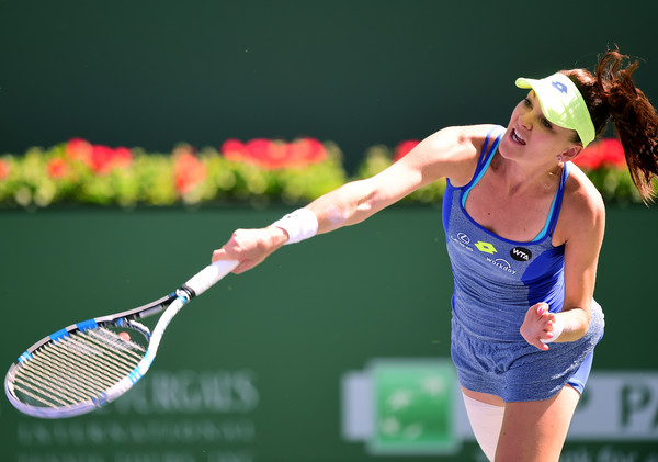 Radwanska hits a serve. Photo: Harry How/Getty Images