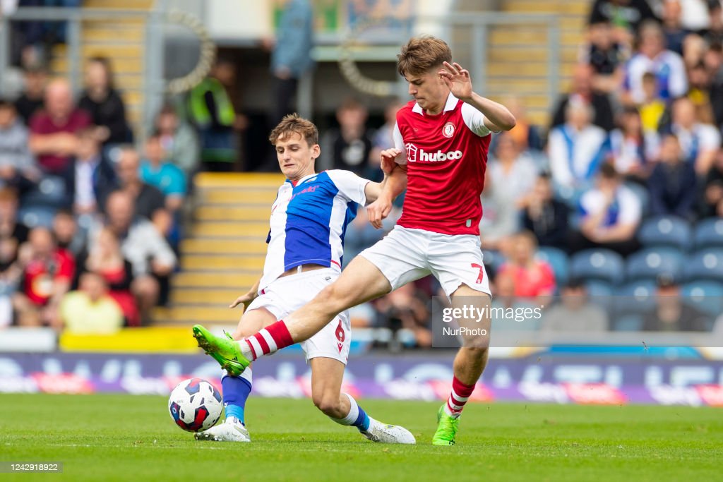 Tyler Morton (6)of Blackburn Rovers tackled by <strong><a href='https://www.vavel.com/en/football/2022/11/01/1128232-bristol-city-0-1-sheffield-united-post-match-player-ratings.html'>Alex Scott</a></strong> (7) of Bristol City during the Sky Bet Championship match between Blackburn Rovers and Bristol City at Ewood Park, Blackburn on Saturday 3rd September 2022. (Photo by Mike Morese/MI News/NurPhoto via Getty Images)