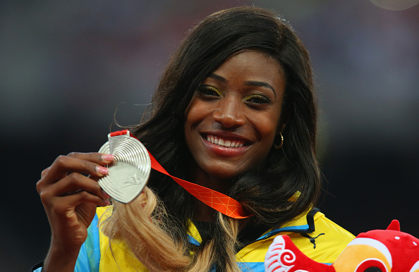 Shaunae Miller receives her silver medals at the World Championships last summer (Getty/Alexander Hassenstein)