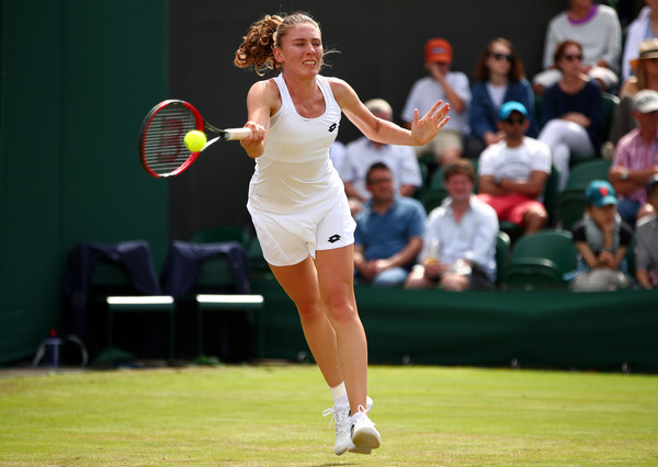 Ekaterina Alexandrova hits a forehand. Photo: Clive Brunskill/Getty Images