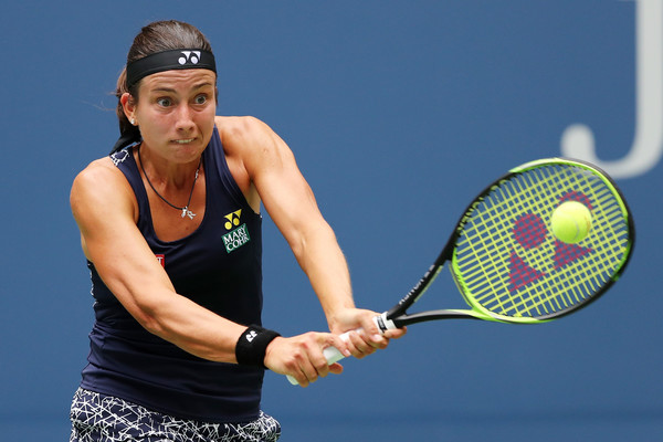 Anastasija Sevastova hits a backhand during her fourth-round match against Maria Sharapova at the 2017 U.S. Open. | Photo: Elsa/Getty Images