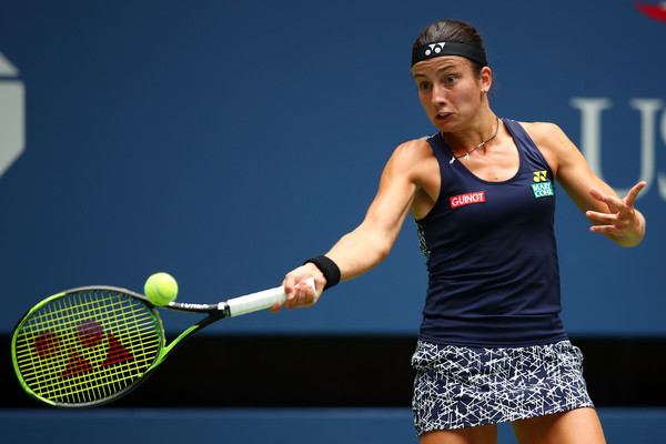 Anastasija Sevastova hits a forehand during her fourth-round match against Maria Sharapova at the 2017 U.S. Open. | Photo: Clive Brunskill/Getty Images