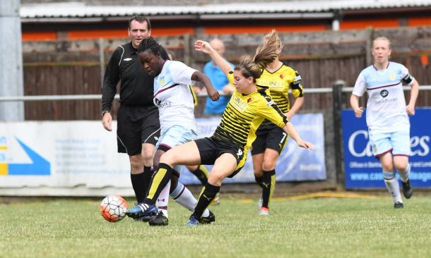 Baptiste tussles for the ball with Ellie Mason (Credit: Andrew Waller)