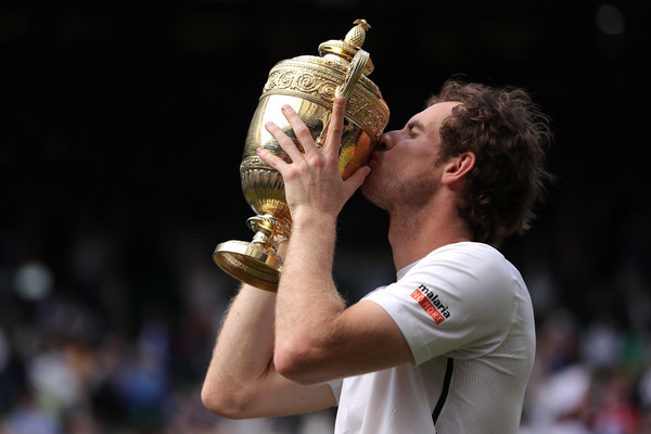 Murray with the Wimbledon trophy (Photo by Pool/Getty Images)