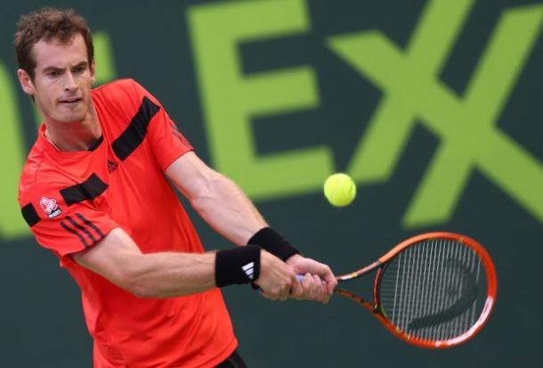 Andy Murray hits a backhand at the 2014 Qatar ExxonMobil Open in Doha/Getty Images