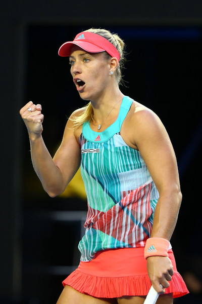 Angelique Kerber celebrates after winning a point against Serena Williams during the final of the 2016 Australian Open. | Photo: Quinn Rooney/Getty Images