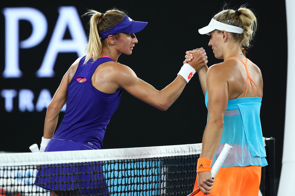 Both players meet at the net after the match | Photo: Cameron Spencer/Getty Images AsiaPac