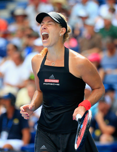 Angelique Kerber roars in delight after grabbing the win | Photo: Chris Trotman/Getty Images North America