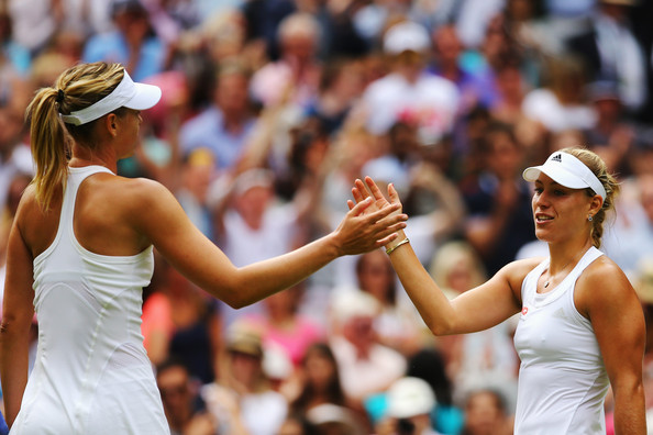 Maria Sharapova and Angelique Kerber meet at the net after their classic at Wimbledon | Photo: Al Bello/Getty Images Europe