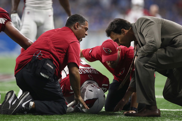 David Johnson #31 of the Arizona Cardinals is attended to by medical staff after a second half injury while playing the Detroit Lions.| Source- Source: Gregory Shamus/Getty Images North America|
