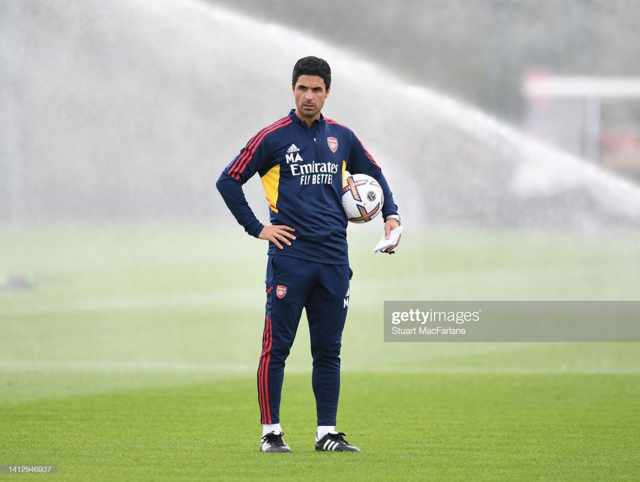 BANS, ENGLAND - AUGUST 04: Arsenal manager <strong><a  data-cke-saved-href='https://www.vavel.com/en/football/2022/07/20/arsenal/1117488-arsenals-transfers-that-just-make-sense-ahead-of-the-upcoming-premier-league-season.html' href='https://www.vavel.com/en/football/2022/07/20/arsenal/1117488-arsenals-transfers-that-just-make-sense-ahead-of-the-upcoming-premier-league-season.html'>Mikel Arteta</a></strong> during a training session at London Colney on August 04, 2022 in St Albans, England. (Photo by Stuart MacFarlane/Arsenal FC via Getty Images)