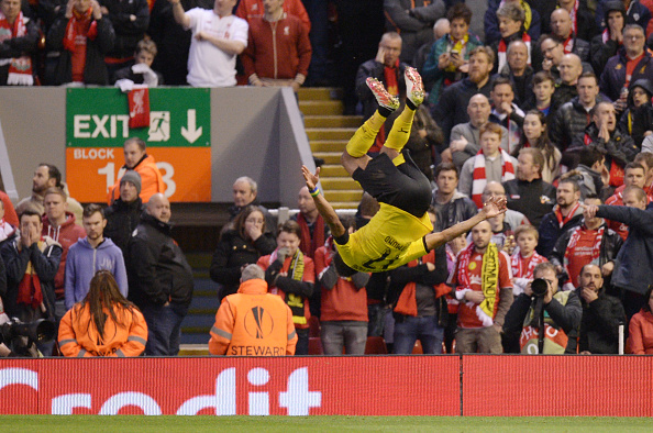 Pierre-Emerick Aubameyang flips in celebration after scoring Borussia Dortmund's second goal of the night. (Getty)