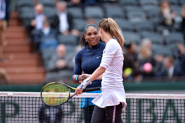 Williams and Rybarikova meet at the net after their brief encounter (Getty/Aurelien Meunier)