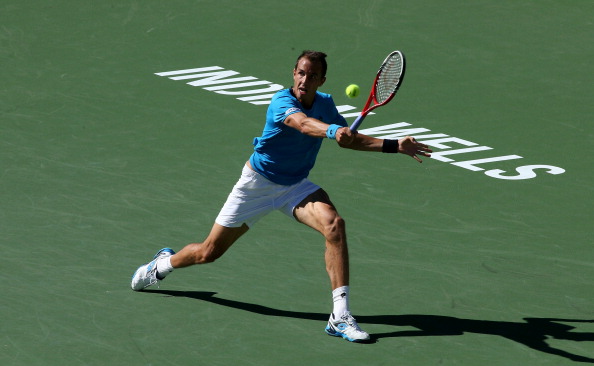 Lukas Rosol hits a retrun to Andy Murray during the BNP Paribas Open (Photo:Stephen Dunn/Getty Images)