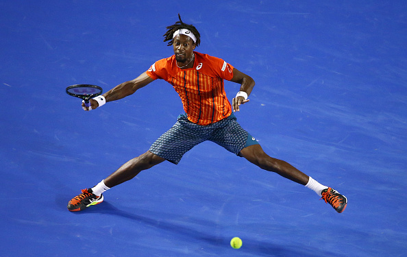 Gael Monfils plays a forehand in his quarter final match against Milos Raonic during the Australian Open (Photo:Scott Barbour/Getty Images)
