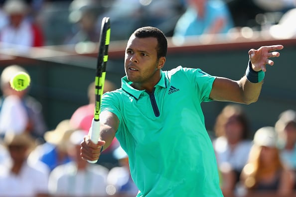 Jo-Wilfried Tsonga in action against Novak Djokovic during day twelve of the BNP Paribas Open at Indian Wells (Photo:Julian Finney/Getty Images) 