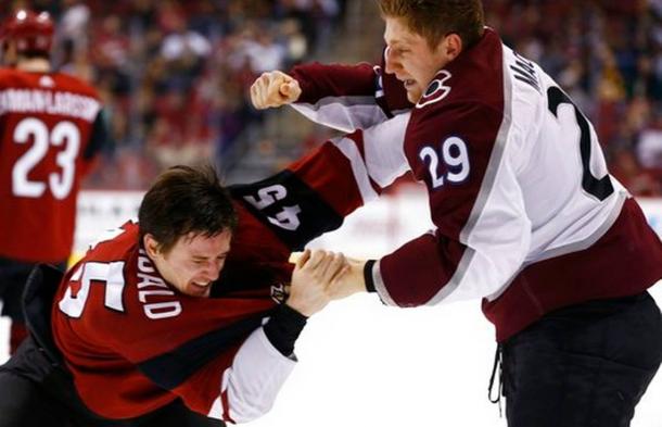 Newly acquired right-wing Josh Archibald takes some lumps in defending his new teammate Zac Rinaldo. (Photo: The News Tribune)