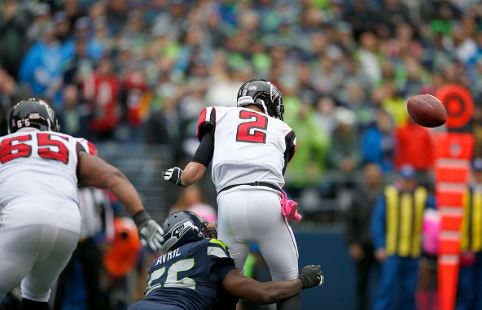 Cliff Avril strip sacks Atlanta Falcons quarterback Matt Ryan | Source: Otto Greule, Jr. - Getty Images