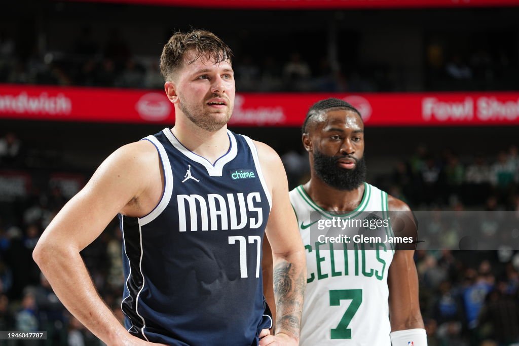Luka Doncic #77 of the Dallas Mavericks and Jaylen Brown #7 of the Boston Celtics look on during the game on January 22, 2024 at the American Airlines Center in Dallas, Texas. NOTE TO USER: User expressly acknowledges and agrees that, by downloading and or using this photograph, User is consenting to the terms and conditions of the Getty Images License Agreement. Mandatory Copyright Notice: Copyright 2024 NBAE (Photo by Glenn James/NBAE via Getty Images)