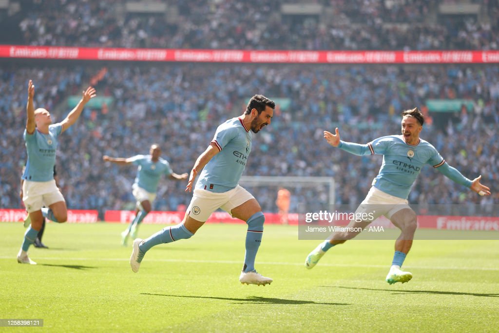Gundogan celebrating after volleying City ahead against Man United in the FA Cup Final (Photo by James Williamson - AMA/Getty Images)