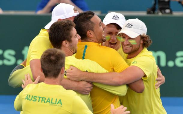 Nick Kyrgios celebrates with his team mates after securing the Davis Cup tie against the USA (Getty/Bradley Kanaris)