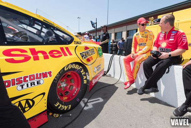 Joey Logano sits with Crew Chief Todd Gordon before qualifying.