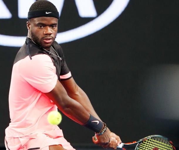 Photo Source: Michael Dodge/Getty Images: Frances Tiafoe hits a backhand winner.