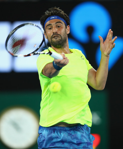 Marcos Baghdatis hits a forehand on Thursday night in Melbourne. Photo: Clive Brunskill/Getty Images