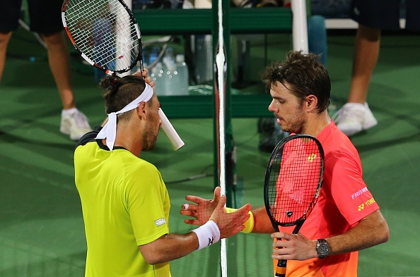 Baghdatis (left) and Wawrinka shake hands after the match. Photo: Marwan Naamani/AFP/Getty Images